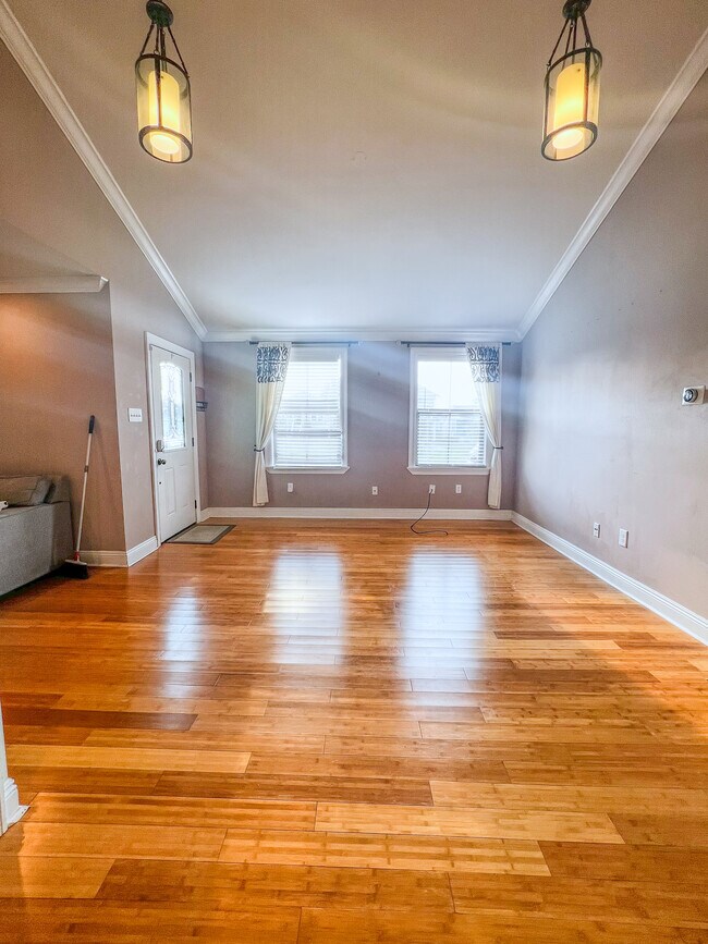 Large dining area, gorgeous bamboo floors - 5717 Pasteur Blvd