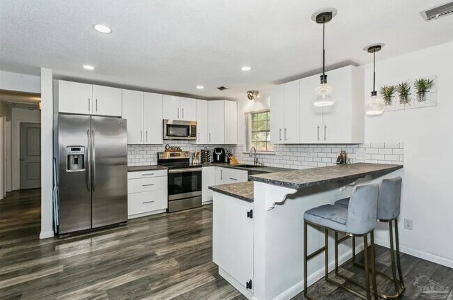 Building Photo - 8023 Stark Ave
