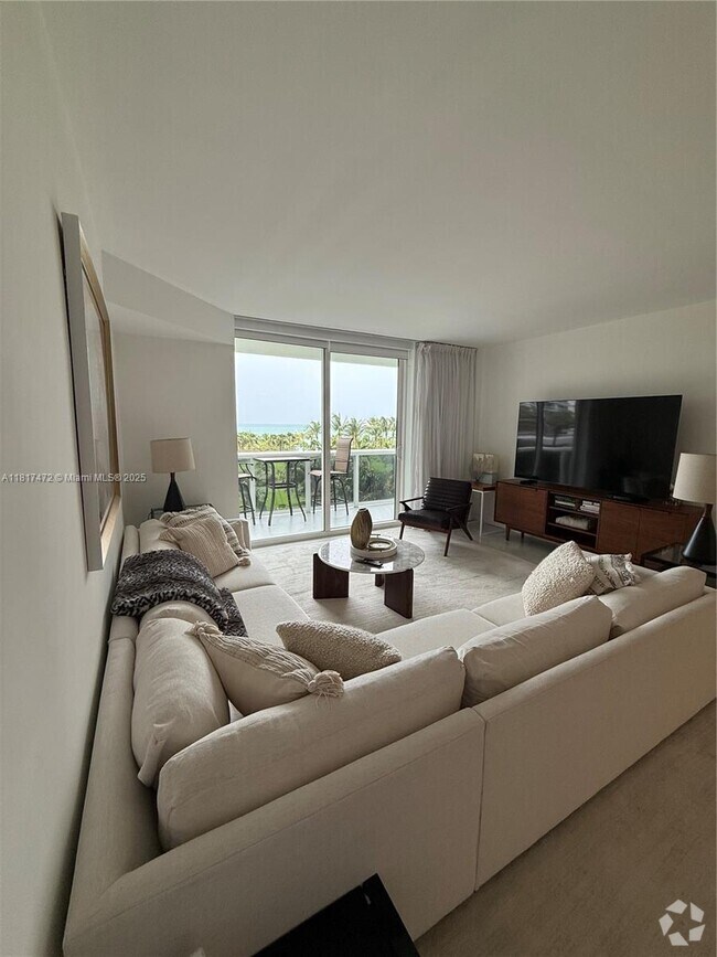 Building Photo - 10275 Collins Ave