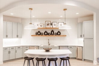 Open Kitchen with Custom Cabinetry, Floating Shelves, and Modern Finishes - The Maggie