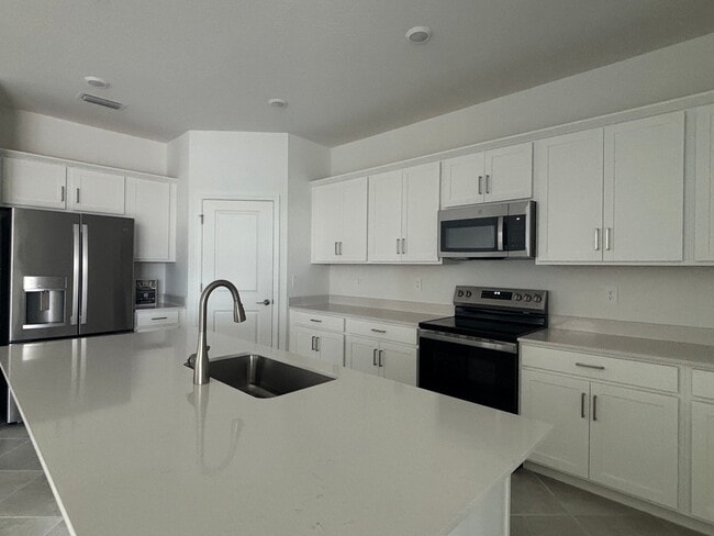 Foto del edificio - 7869 Lakes Edge Ln