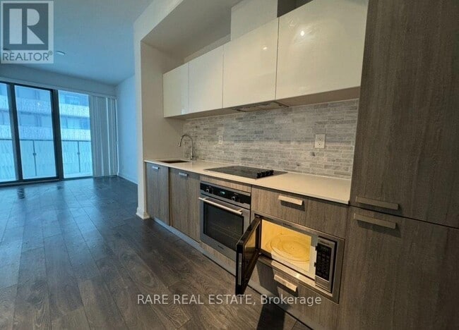 Building Photo - 50 Charles St E