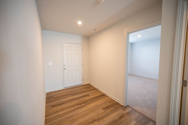 Building Photo - Brand new 4-bedroom / 3 Bath with a main-l...