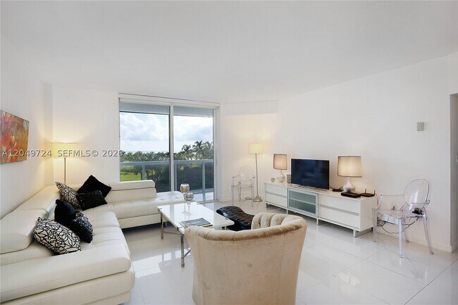 Building Photo - 10275 Collins Ave