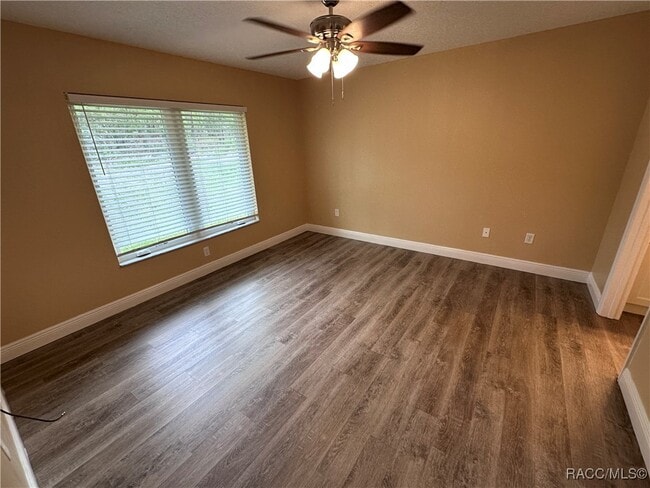 Building Photo - 7779 N Triana Dr