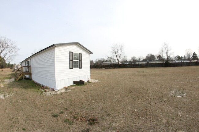 Building Photo - 7025 Ottis Ln