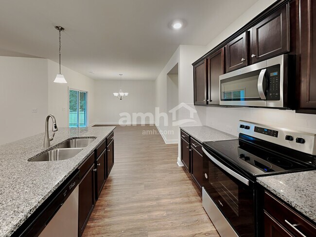 Building Photo - 7058 Creeksong Dr