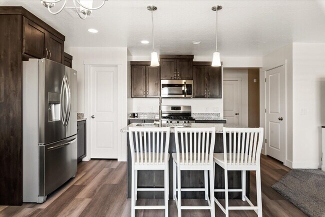 Building Photo - "Spacious 4-Bedroom Townhouse Retreat on S...