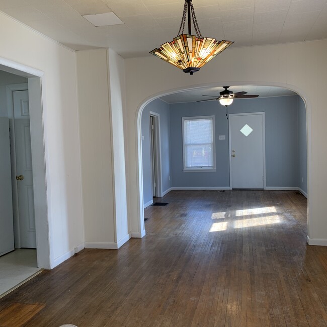 Dining room looking into living room and front door - 303 E Vermilya Ave