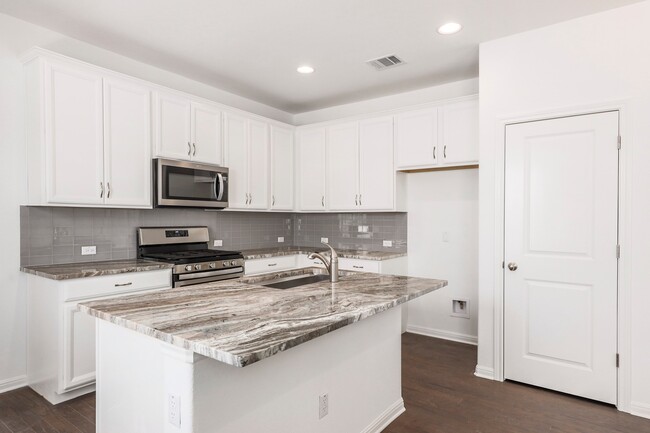 Kitchen (new refrigerator not yet installed when photo was taken) - 17325 Alturas Ave