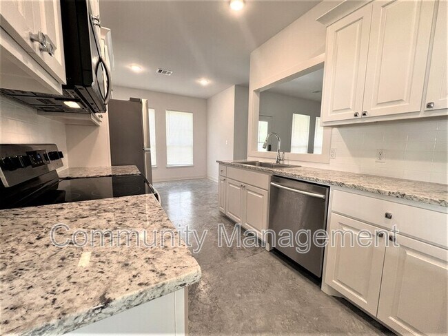 Foto del edificio - 7677 River Ridge Dr