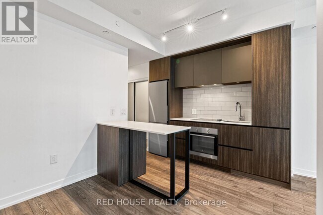 Photo du bâtiment - 34 Tubman Ave