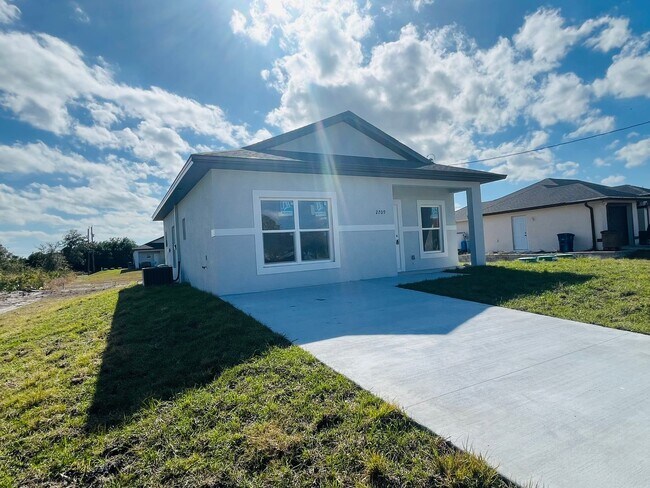 Building Photo - Brand-New 2BR/2BA Home with Lanai on Oversized Lot – Desirable SW Lehigh Acres