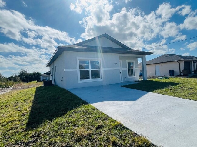 Photo - Brand-New 2BR/2BA Home with Lanai on Oversized Lot – Desirable SW Lehigh Acres