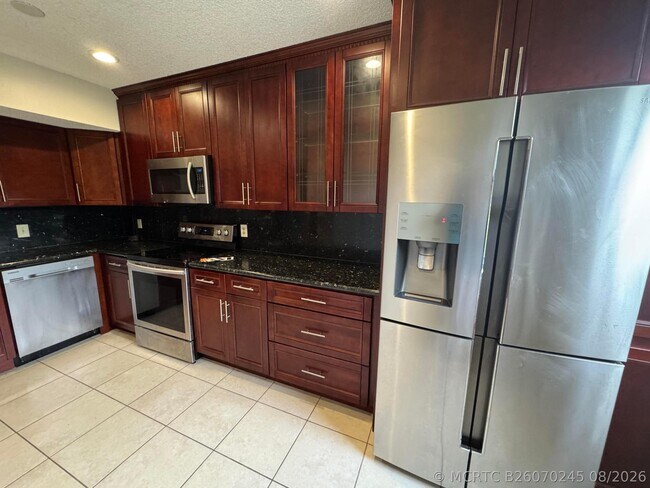 Building Photo - 8781 Wiles Rd