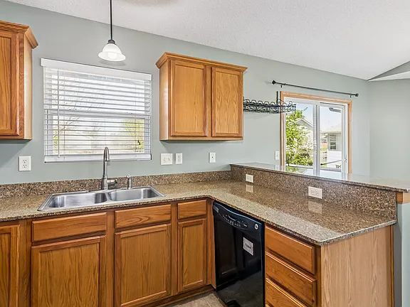 Building Photo - "Spacious 4-Bedroom Family Home with Cozy Fireplace in Wichita - 2261 Sq Ft of Comfort!"