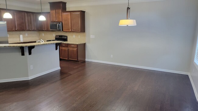 Building Photo - Townhome with 3BR/2.5BA Garage Located in ...