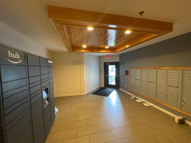 Building Photo - Modern Ground-Floor Condo in Gated Communi...