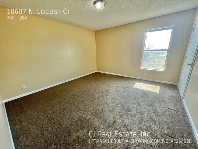 Foto del edificio - 10607 N Locust Ct
