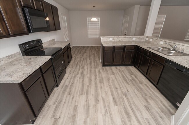 Foto del edificio - 5415 Gouldburn River Dr