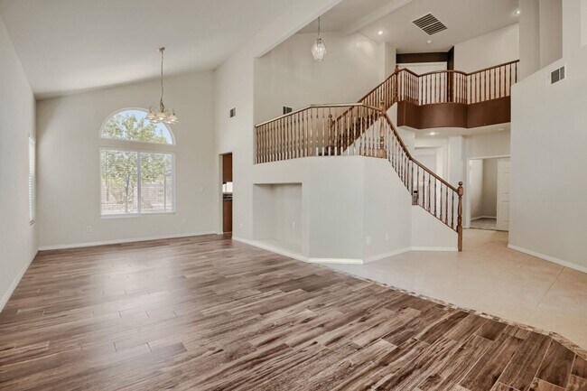 Building Photo - Spacious 4-Bedroom Home with 3-Car Garage & Mountain Views