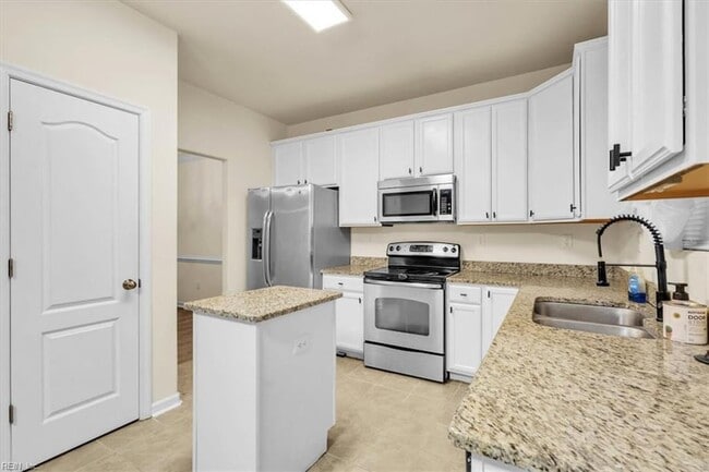 Building Photo - 9449 Garrett Ave