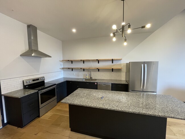 Kitchen w/ Stainless Appliances - 214 W Jefferson Ave