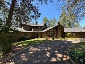 Building Photo - 60615 River Bend Dr