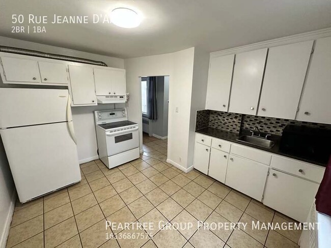 Building Photo - Joyful Jeanne-D'Arc-2 bed apartment for rent