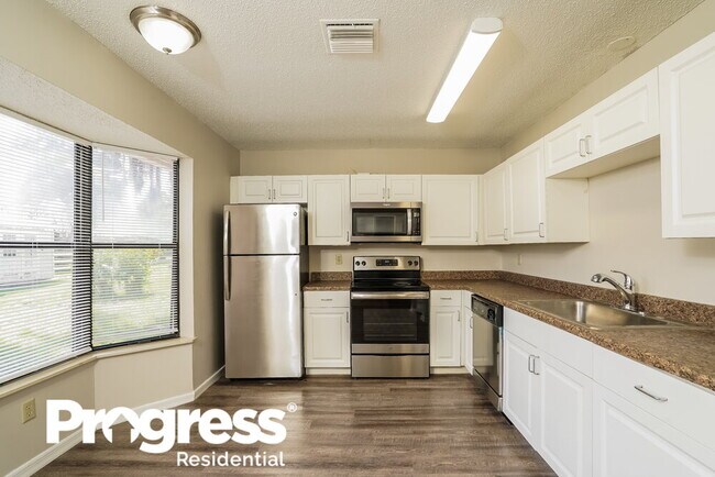 Building Photo - 6514 Flora Way