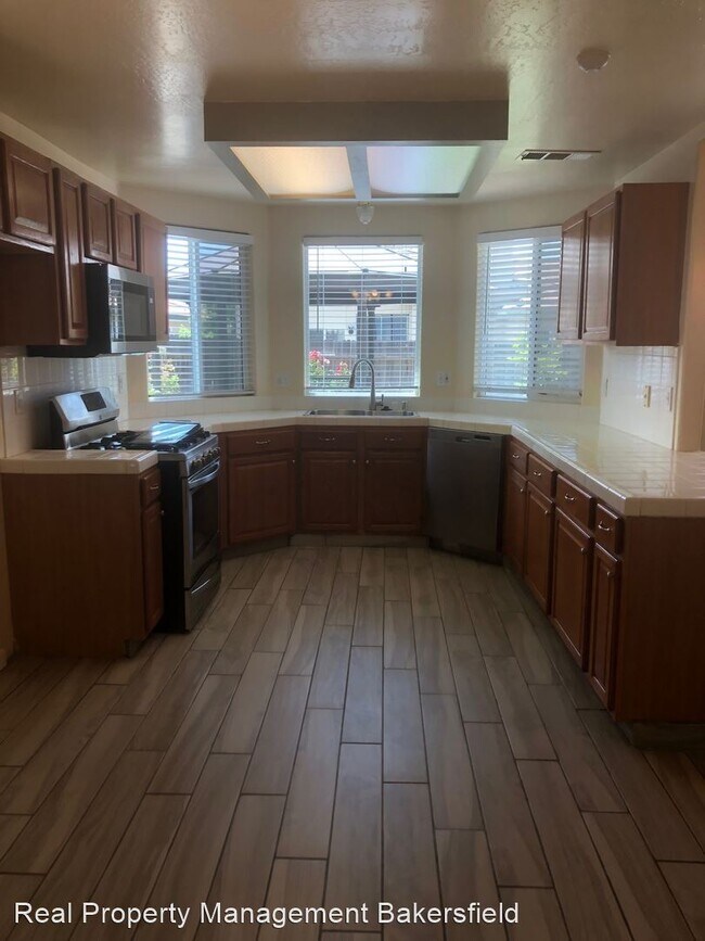 Foto del edificio - 4 br, 3 bath House - 8605 Hoodsport Ave