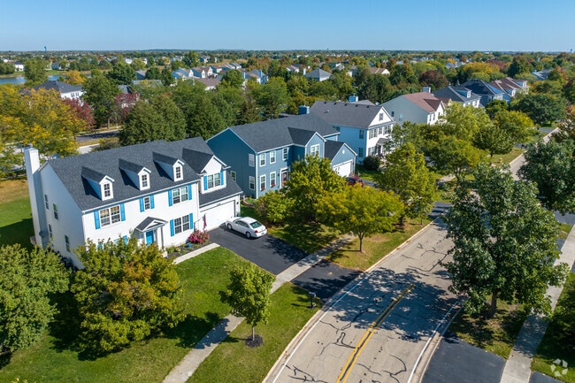 A beautiful row of homes displaying popular home styles in Freedom Park.