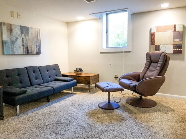 Living area w/egress window - 223 E Rose St