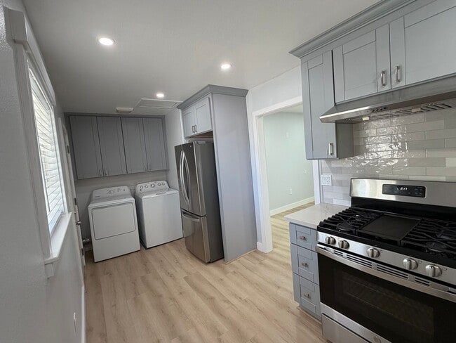 Building Photo - Bright & Spacious 1 Bedroom + 1 Bath with Private Yard & In-Unit Laundry