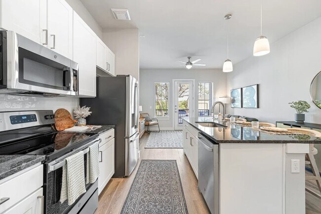 Building Photo - 100% off rent for 1 month(s) on a 12 mo le...