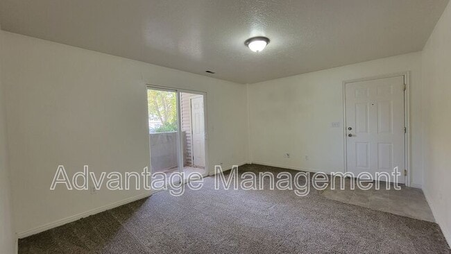 Building Photo - 8083 N Ridge Loop E