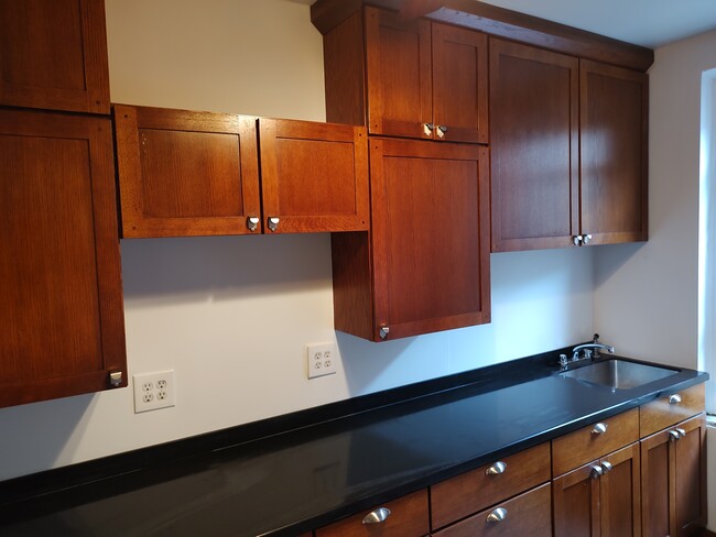 Beautiful Walnut Cabinets - 2 Colonel Robert Magaw Plz