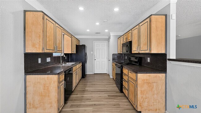 Building Photo - 3202 Tom Lockett Dr