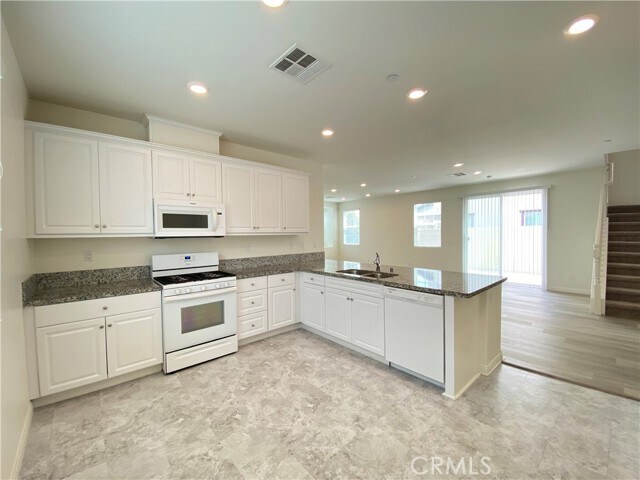 Foto del edificio - 6129 Rosewood Way