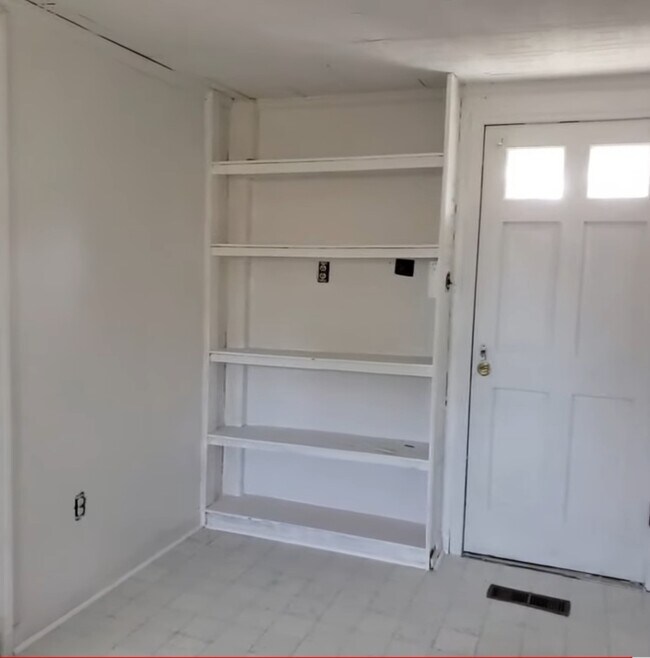Built-in bookshelves - 2202 Trailwood Dr