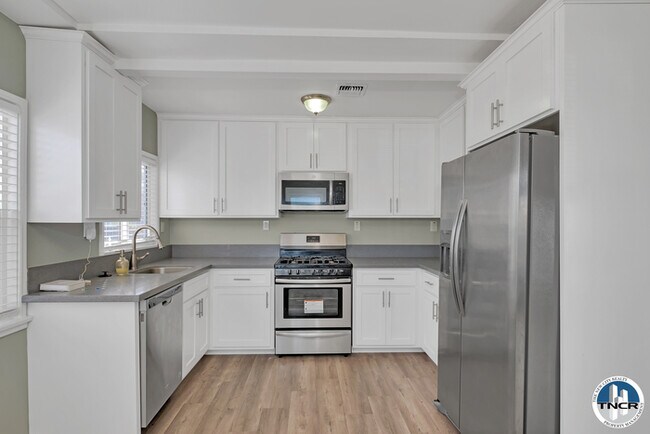 Building Photo - 7223 S Denker Ave