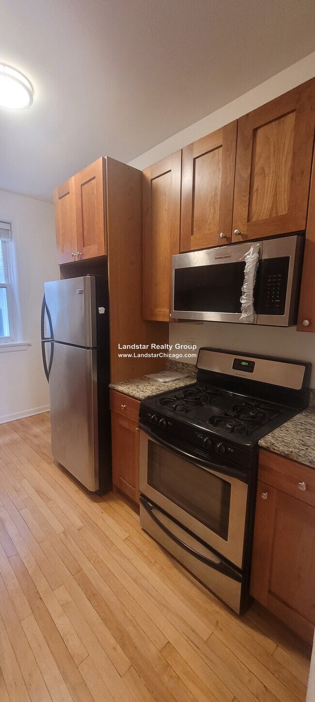 Foto del edificio - 4946 N Ridgeway Ave