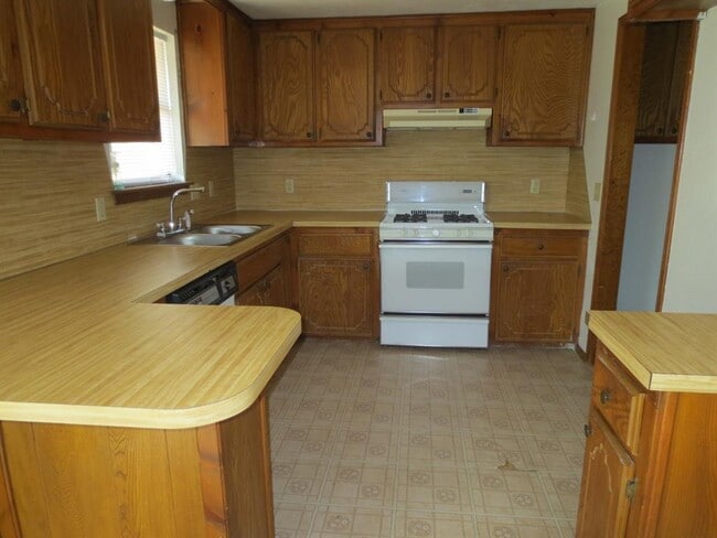 Building Photo - 8421 Bigwood Dr