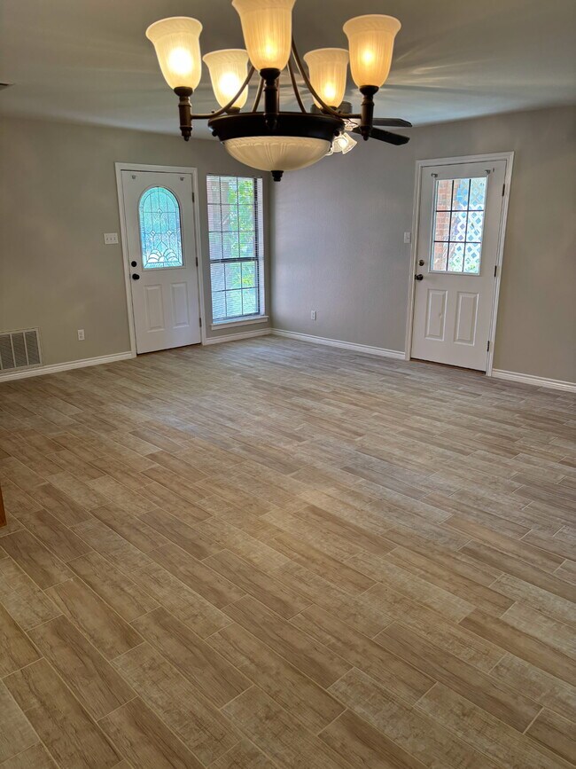 Sala de estar - 203 Bluebonnet St