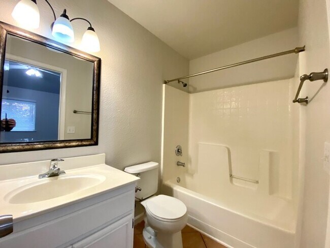 Building Photo - Spacious 2BR/2BA Condo with Private Patio,...