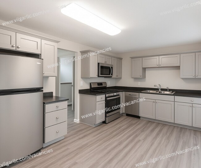 Foto del edificio - This is your forever home! 5 spacious bedrooms, 2 full bathrooms house in Gary, IN