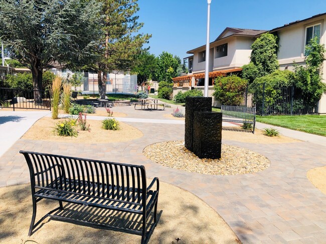 Clubhouse with New Fountain and Picnic Area - Carson Catalina Apartments