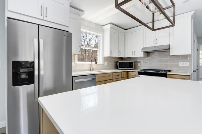 Foto del edificio - 6007 W Jersey Ave