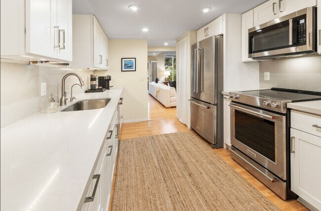 View from kitchen to to stylish entertainment area - 13730 15th Ave NE