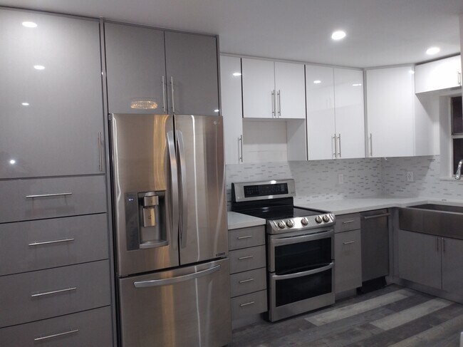 Custom Kitchen cabinets with double oven, Bosch Dishwasher, huge apron sink, trash can cabinet... - 7505 SW 82nd St